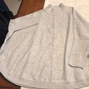 Pretty knit grey, blue speck poncho top.